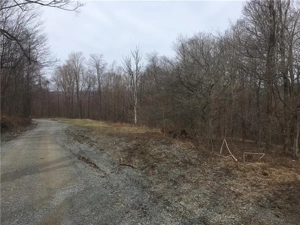 a view of outdoor space with chairs