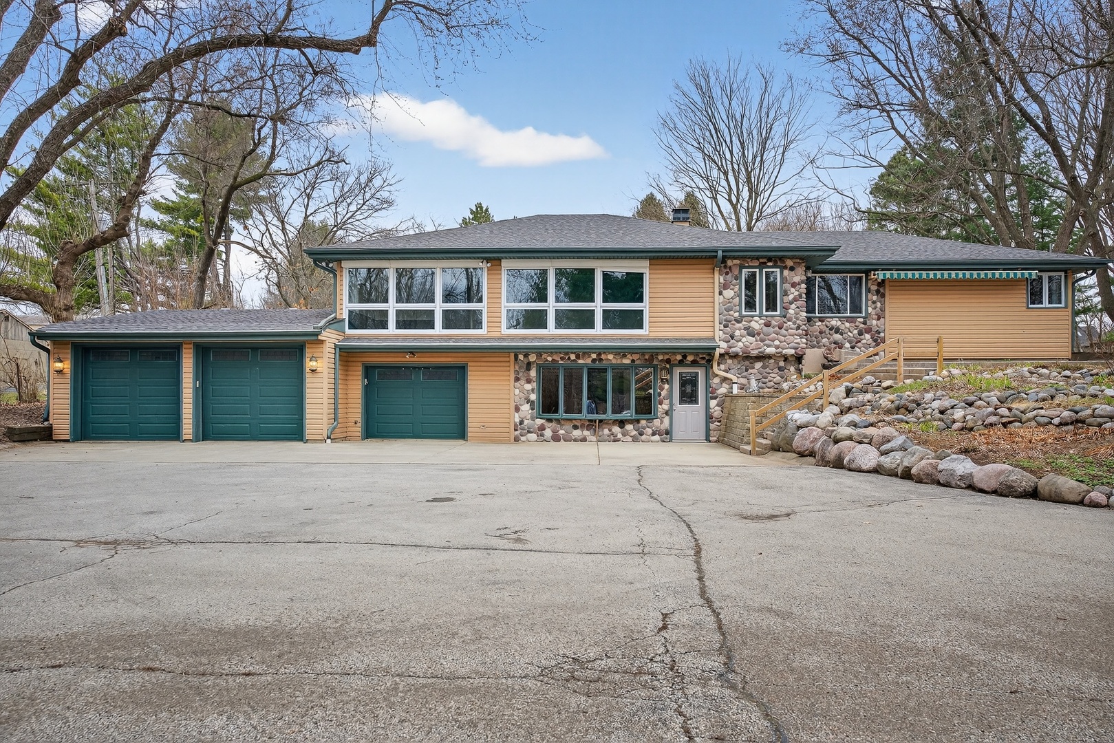 front view of a house with a yard