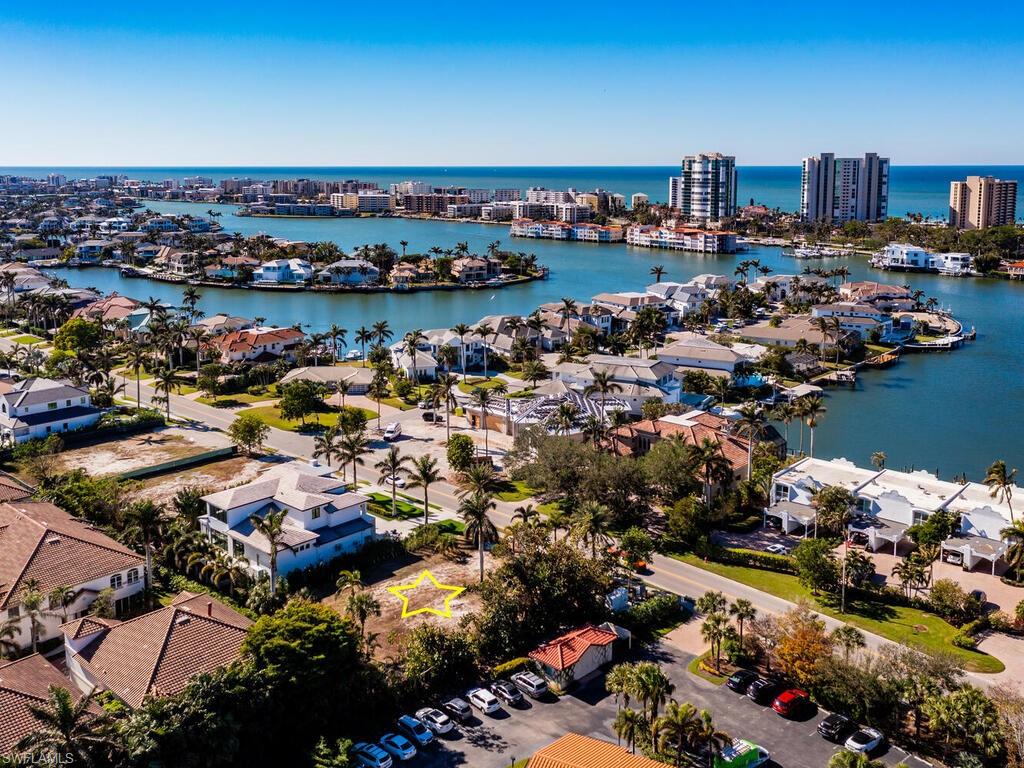 3940 Crayton Road Naples, FL 34103 - Photo 3 of 8 a view of a city