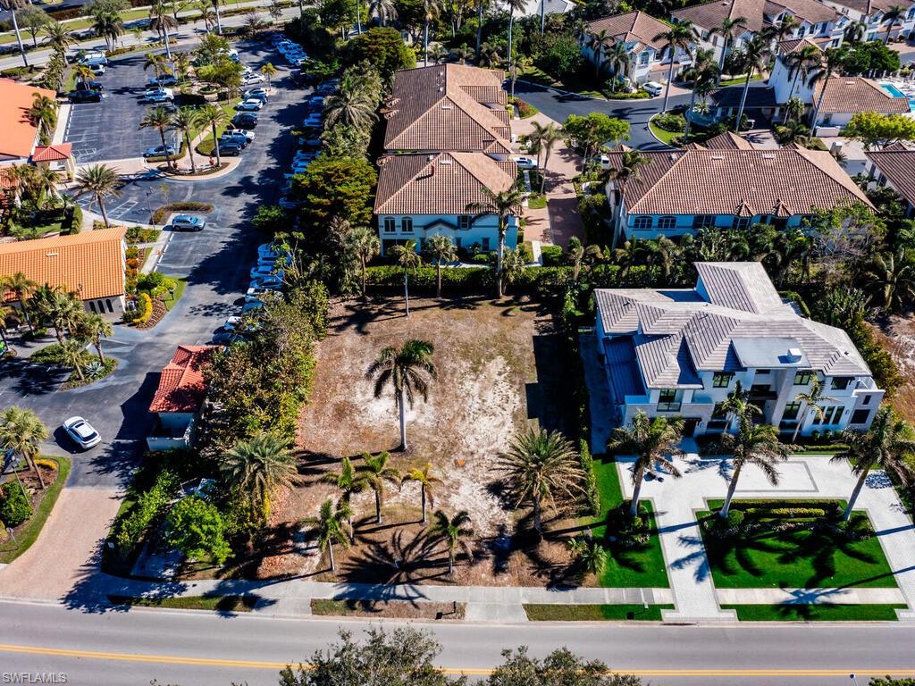 3940 Crayton Road Naples, FL 34103 - Photo 5 of 8 an aerial view of multiple house