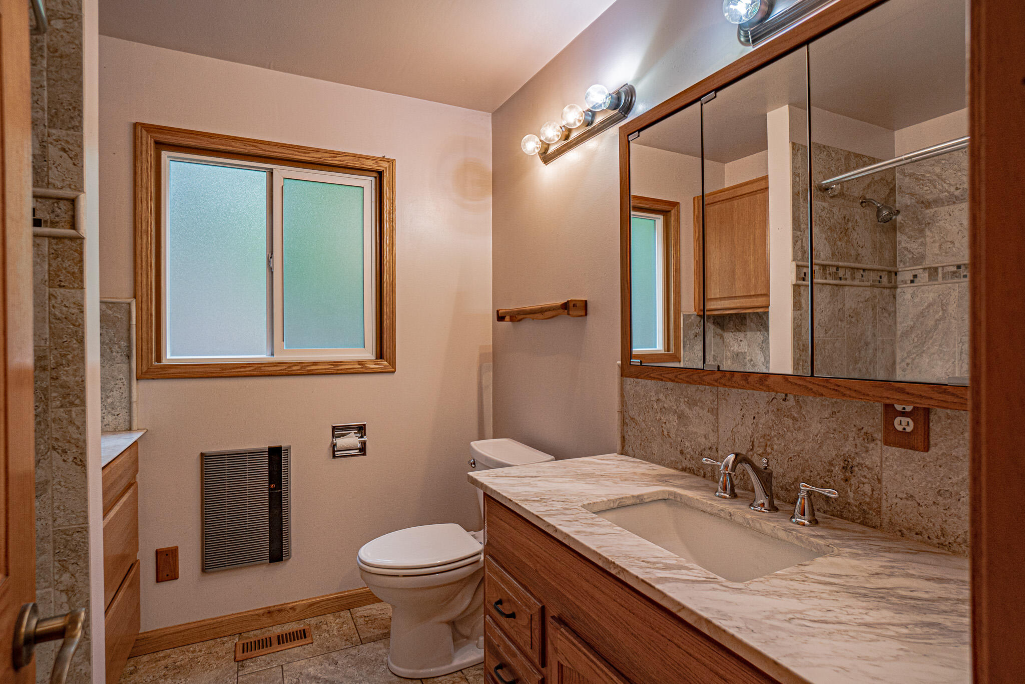 2728 Anderson Creek Road Talent, OR 97540 - Photo 14 of 45 a bathroom with a granite countertop sink toilet and shower