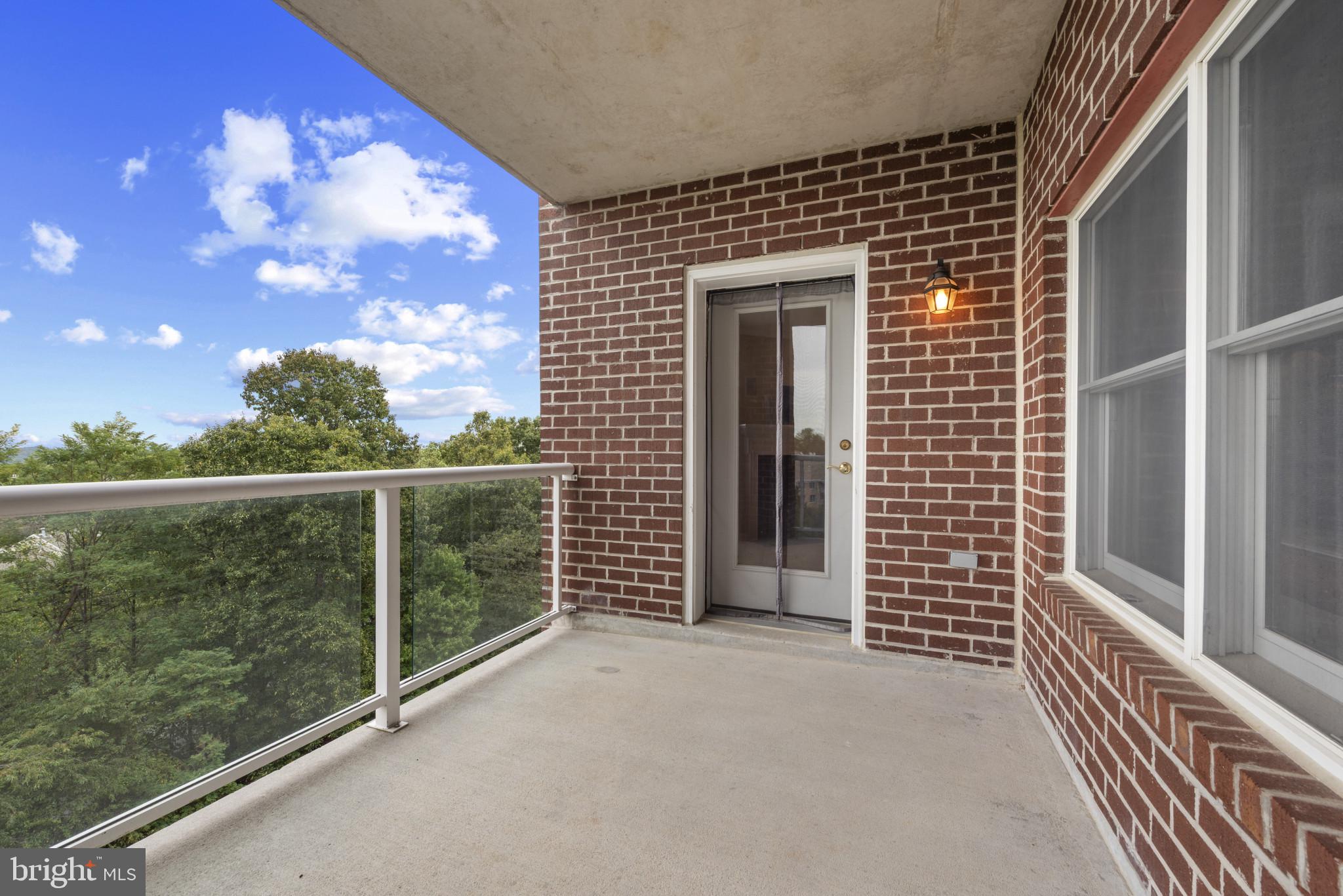 12240 Roundwood Road, Unit 704 Lutherville-Timonium, MD 21093 - Photo 19 of 22 a view of a balcony