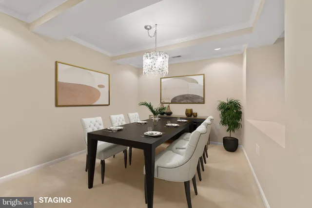 a view of a dining room and chairs