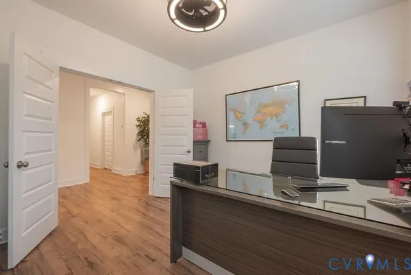 a spacious bedroom with a bed and a couch