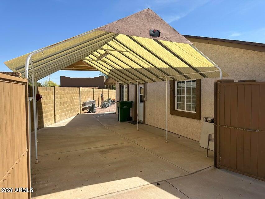 7745 East Mangun Road Mesa, AZ 85207 - Photo 5 of 35 a view of a house with a outdoor space