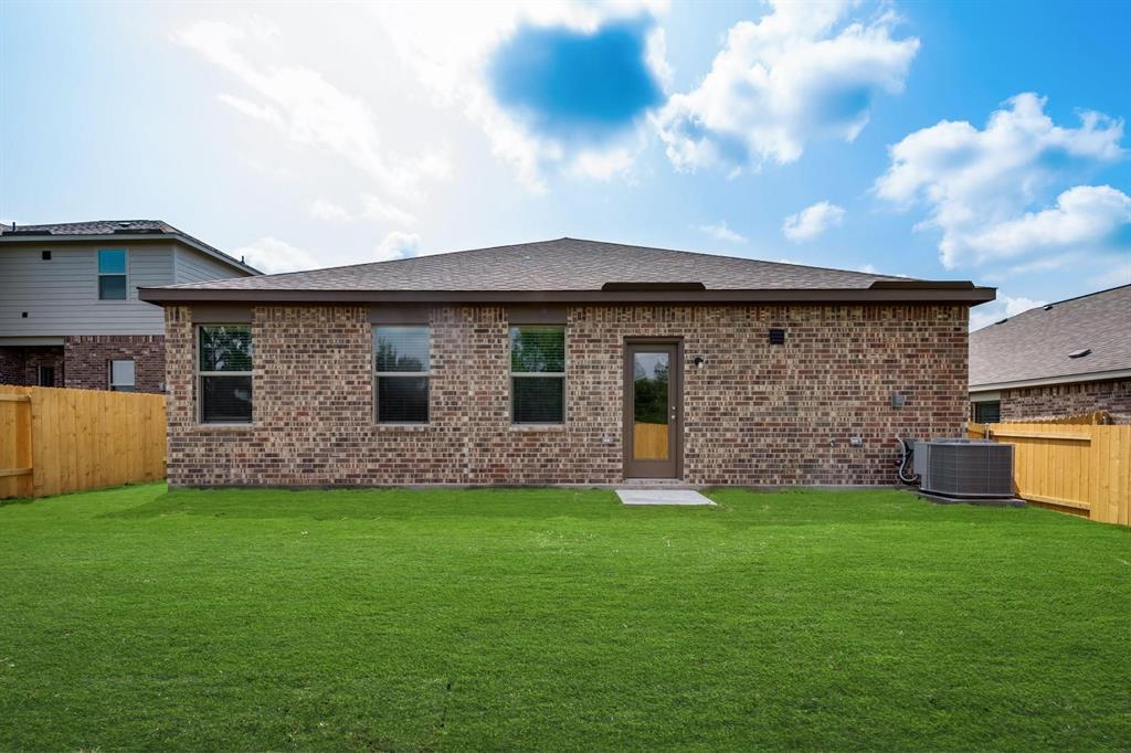 304 Wandering Stream Way Princeton, TX 75407 - Photo 13 of 13 a front view of a house with a yard