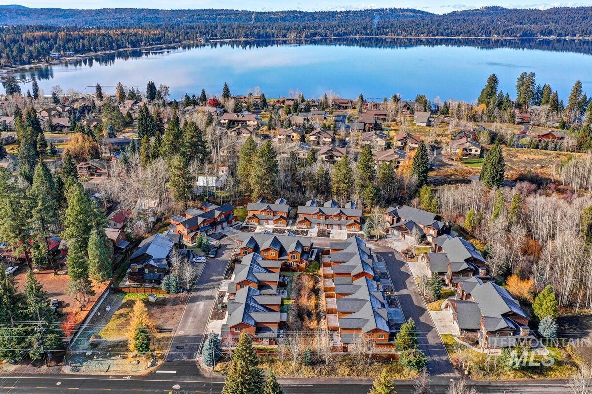 609 Blue Water Circle McCall, ID 83638 - Photo 5 of 45 Aerial perspective of suburban area with a large body of water