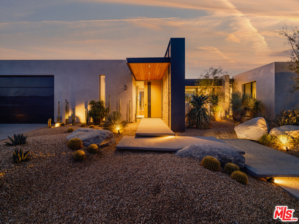 3 Echo Lane Rancho Mirage, CA 92270 - Photo 2 of 39 a living room with furniture pool table and a fireplace
