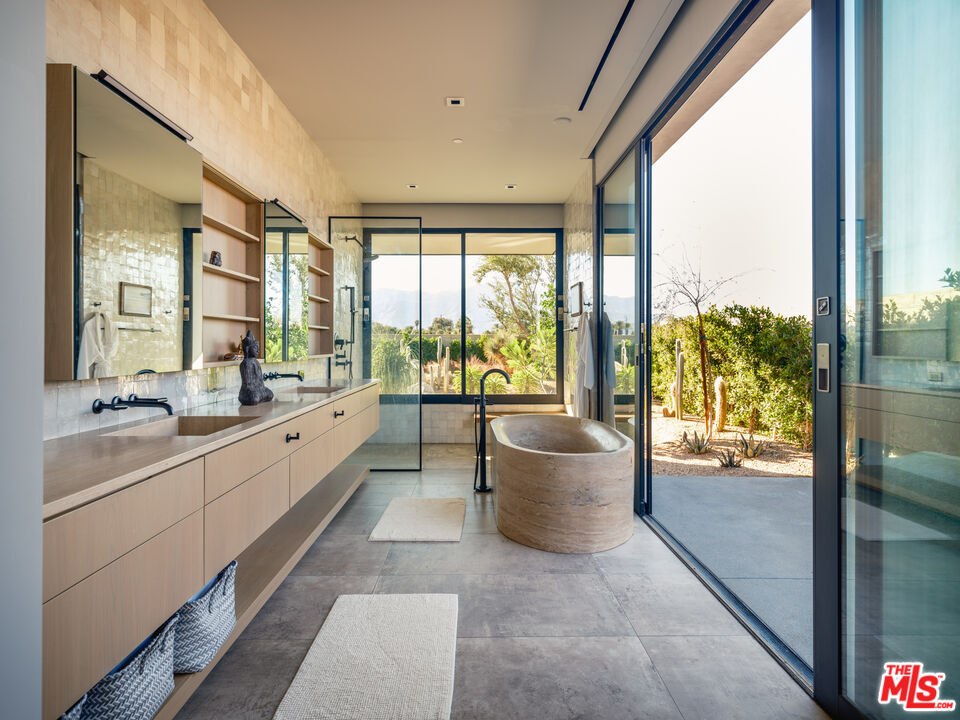 3 Echo Lane Rancho Mirage, CA 92270 - Photo 22 of 39 a large white room with a large window and pool table