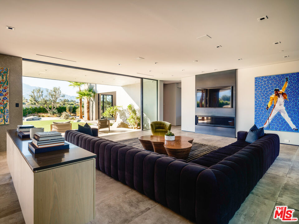 3 Echo Lane Rancho Mirage, CA 92270 - Photo 7 of 39 a living room with furniture and a large window