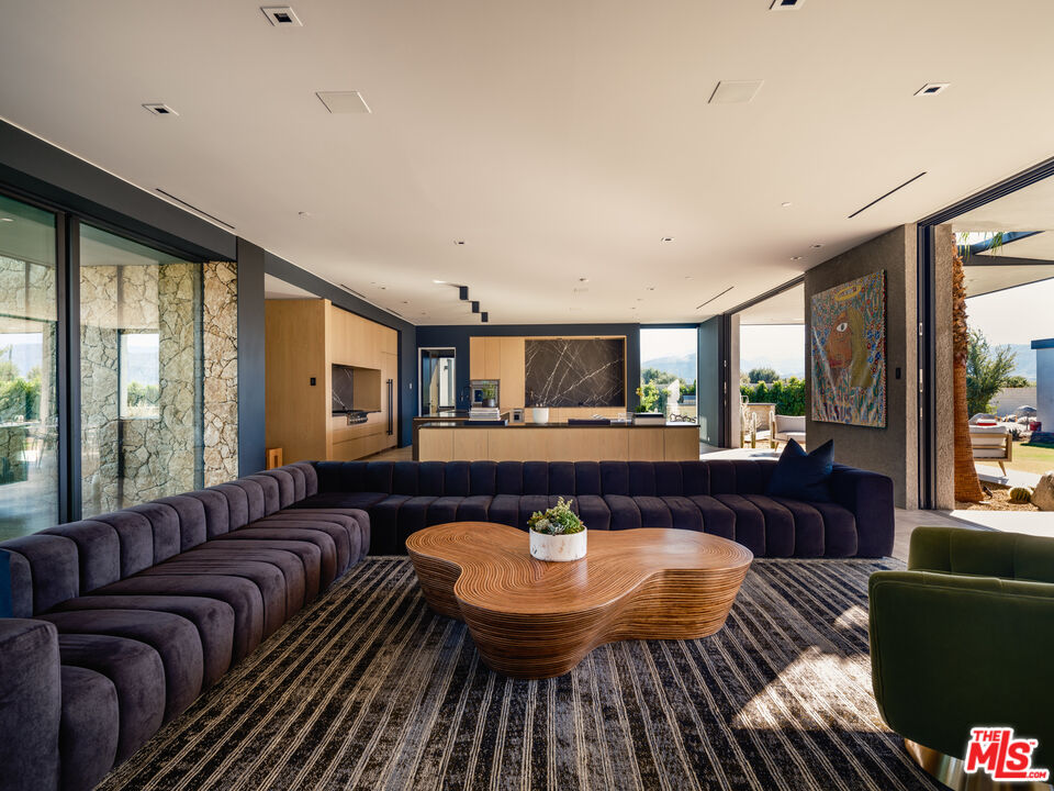 3 Echo Lane Rancho Mirage, CA 92270 - Photo 8 of 39 a living room with furniture and a large window