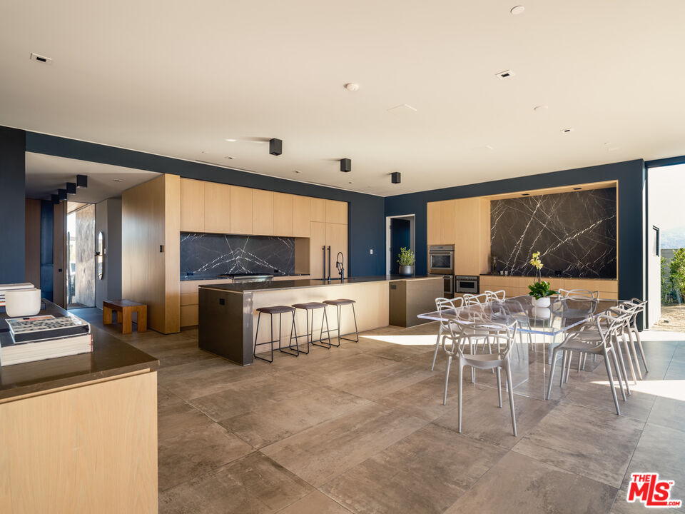 3 Echo Lane Rancho Mirage, CA 92270 - Photo 10 of 39 a living room with fireplace furniture and a flat screen tv