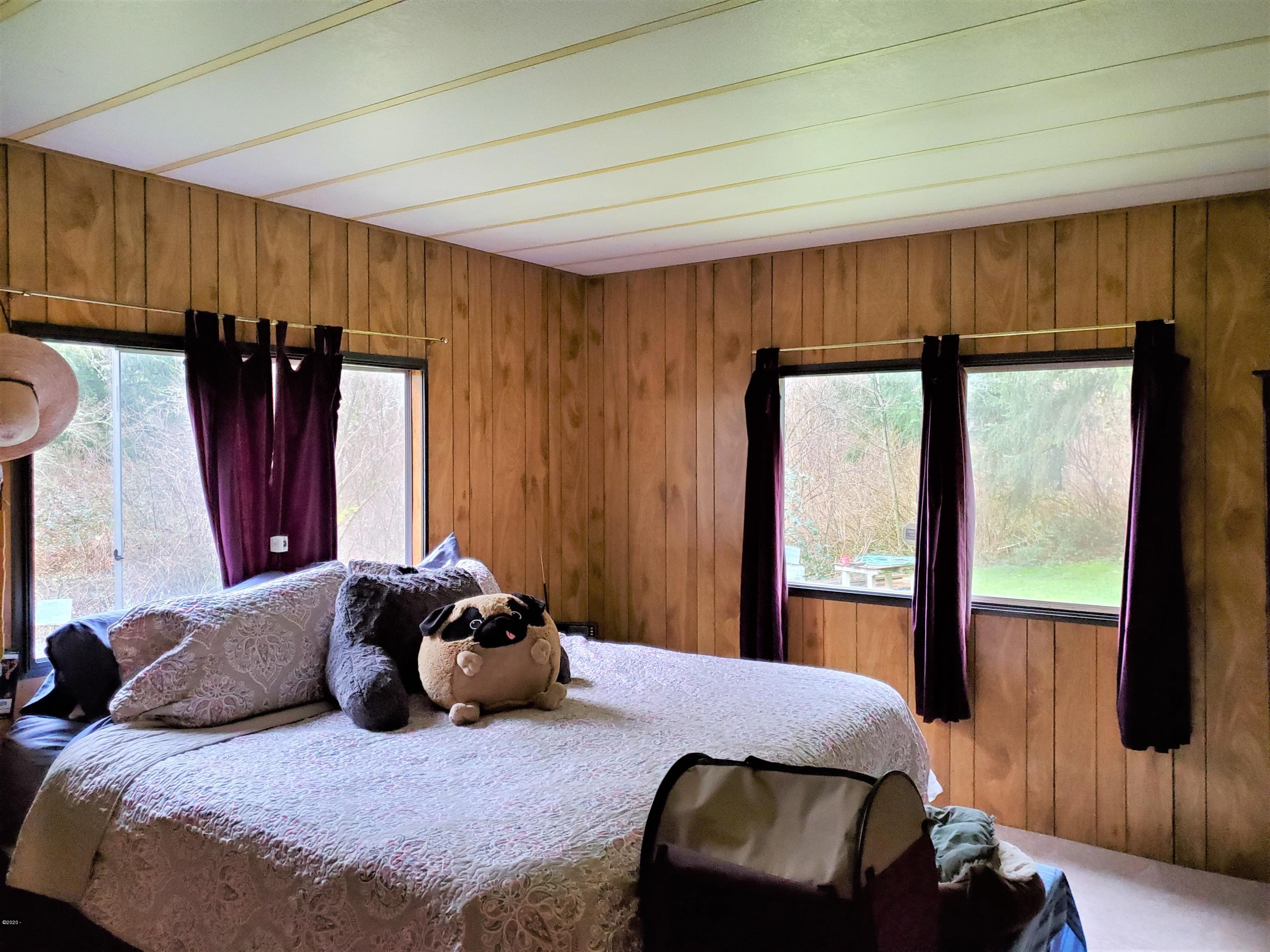 5591 Northeast Highland Road Otis, OR 97368 - Photo 10 of 21 Master Bedroom View 1