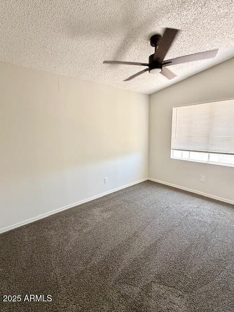 1847 North Warner Drive Apache Junction, AZ 85120 - Photo 14 of 18 an empty room with a ceiling fan and a window