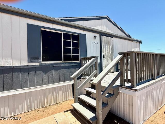 1847 North Warner Drive Apache Junction, AZ 85120 - Photo 3 of 18 a view of staircase with railing and white walls