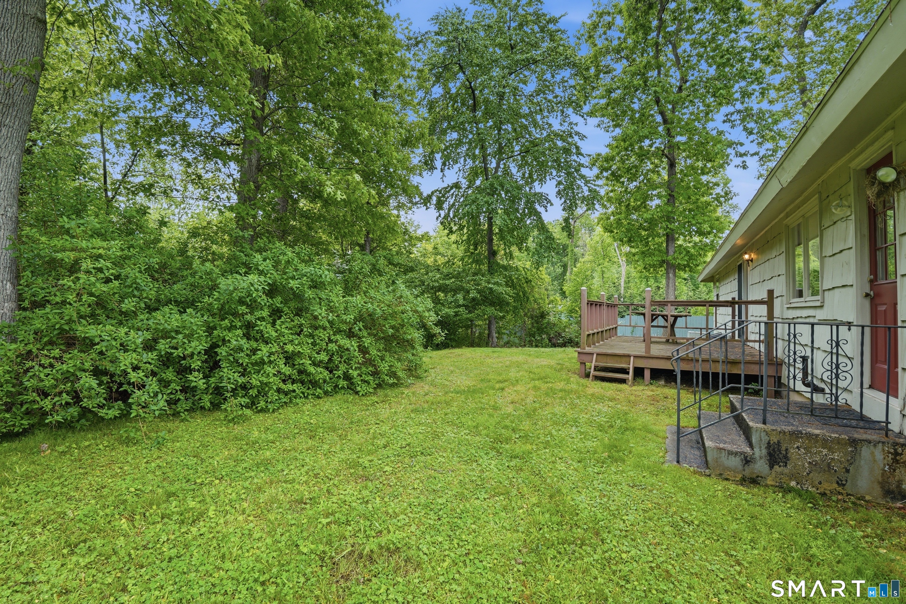 731 Still Hill Road Hamden, CT 06518 - Photo 37 of 40 a view of an house with backyard space and sitting area