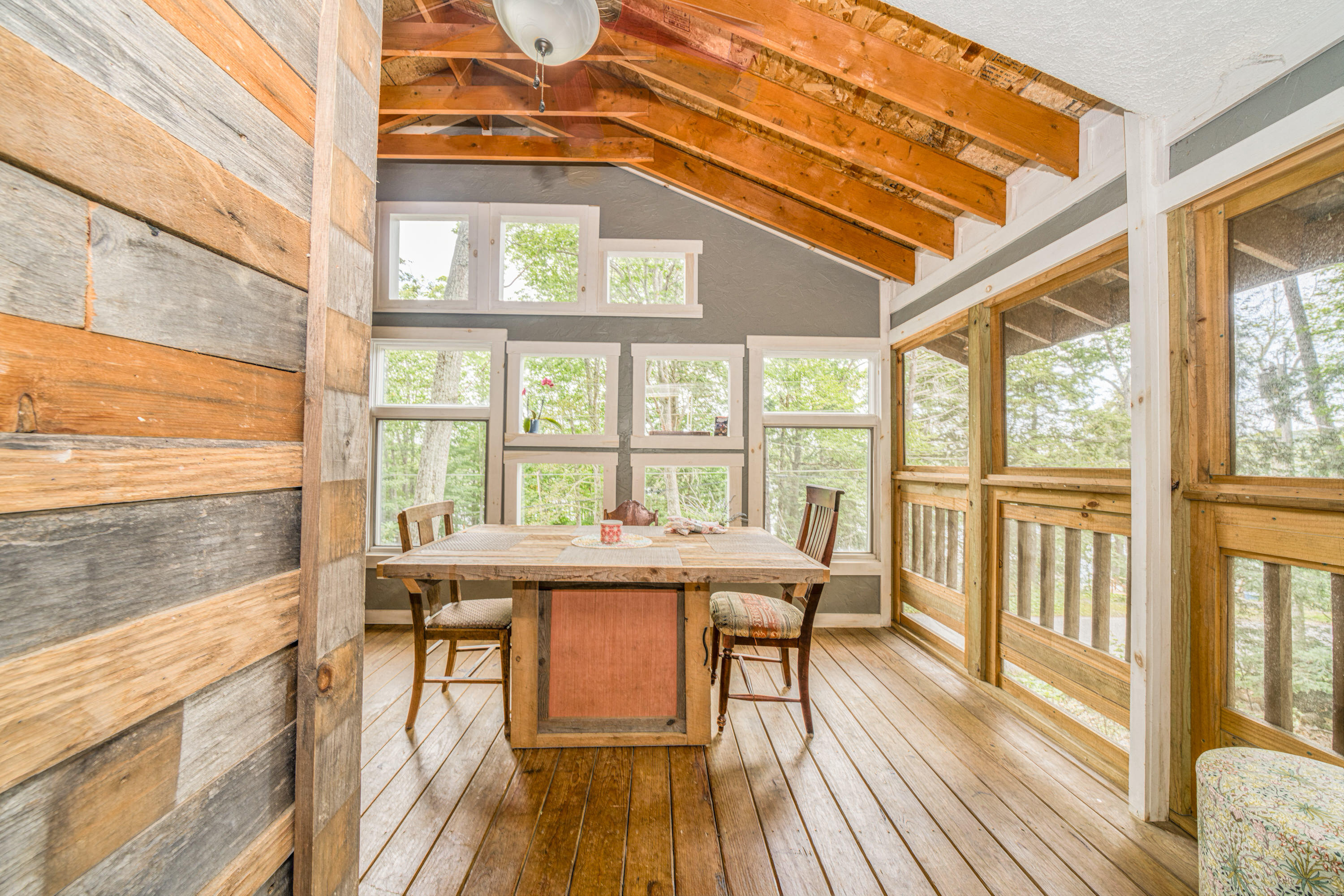 999 Brewer Lake Road Orrington, ME 04474 - Photo 24 of 36 Screened porch from living room