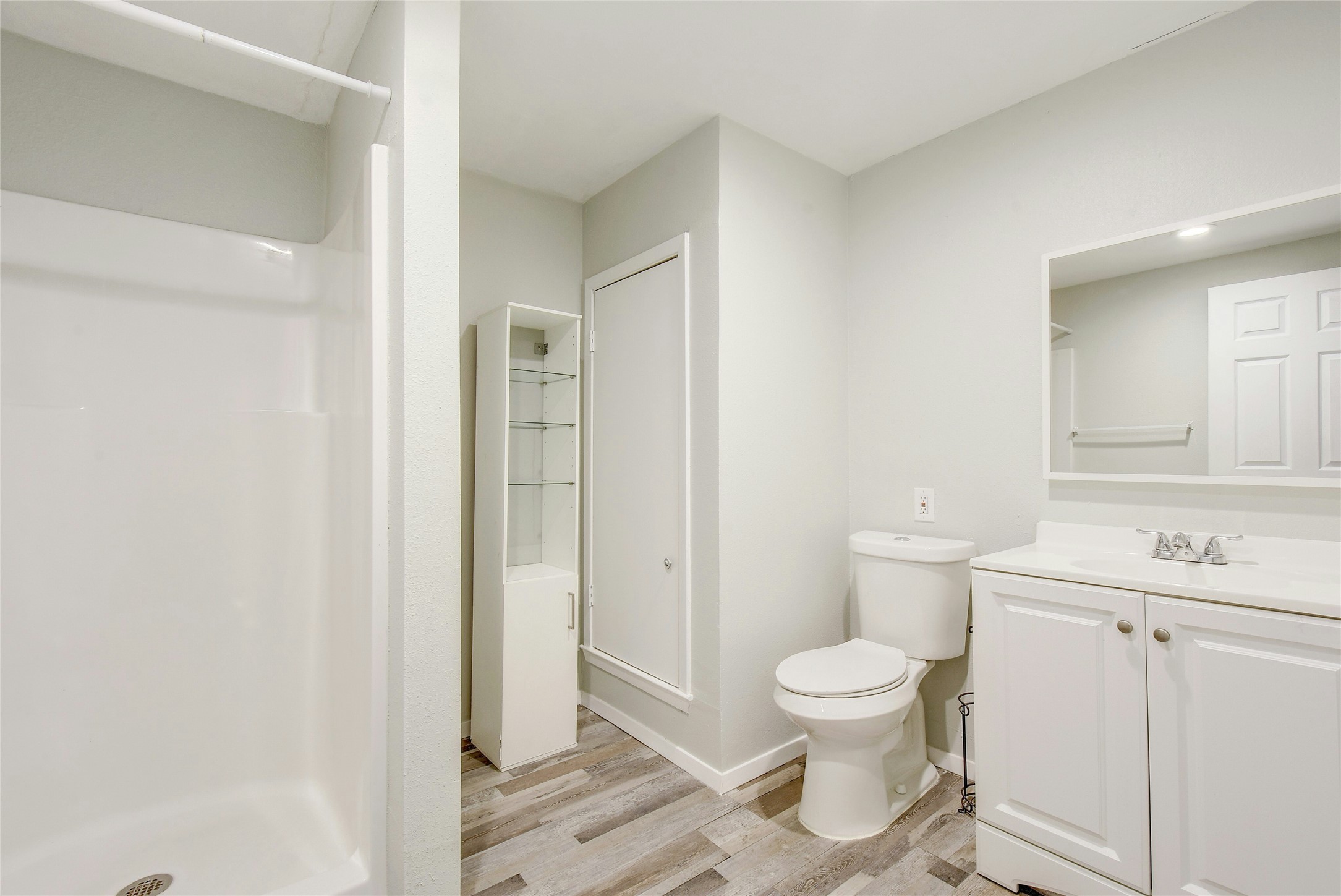5610 Meadow Crest Austin, TX 78744 - Photo 15 of 25 a white toilet sitting next to a bathroom sink