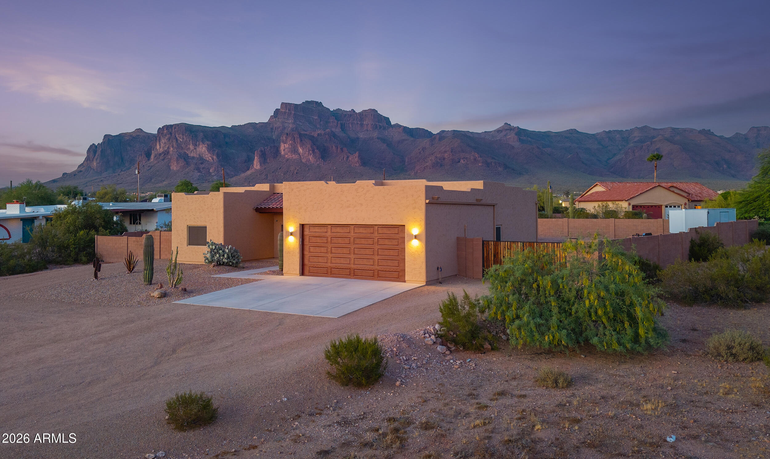 1487 South Mountain View Road Apache Junction, AZ 85119 - Photo 6 of 60 a view of a street with a house in the background