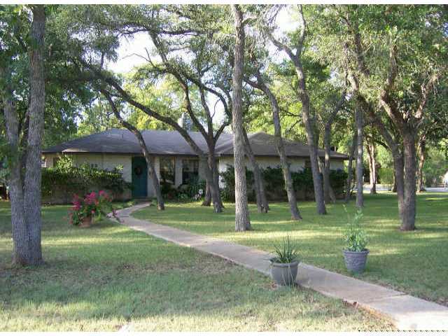 2800 Hummingbird Road Manchaca, TX 78652 - Photo 1 of 1 a view of a park with large trees
