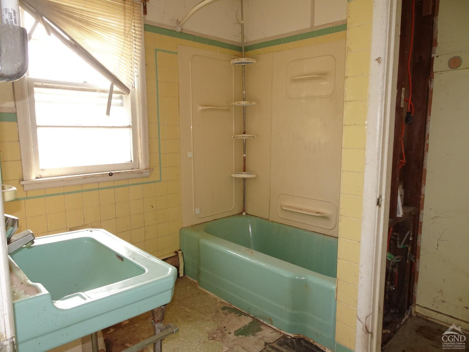8 Hover Road Claverack, NY 12513 - Photo 11 of 21 a bathroom with a bath tub and a shower