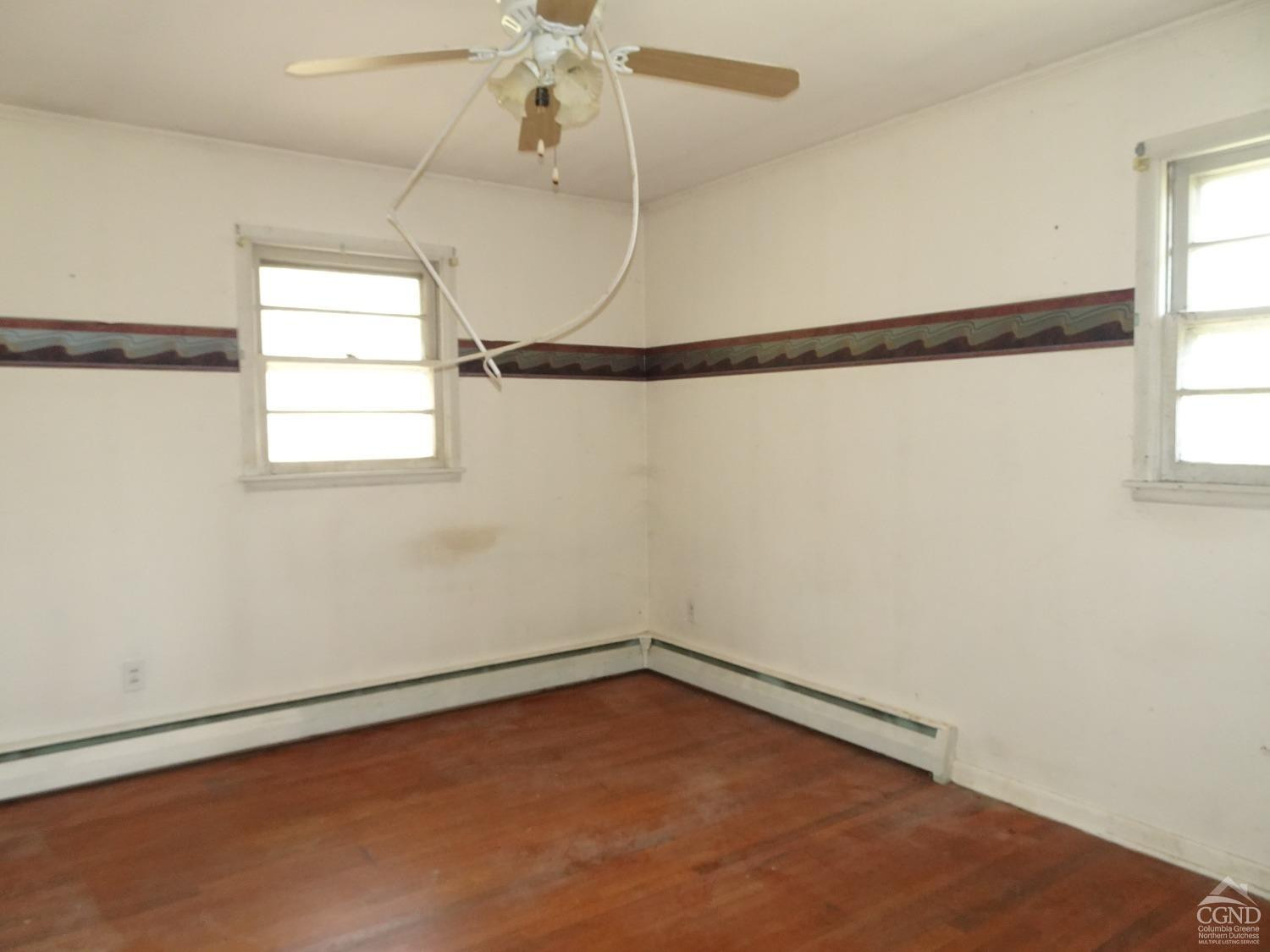 8 Hover Road Claverack, NY 12513 - Photo 15 of 21 an empty room with a window and a fan
