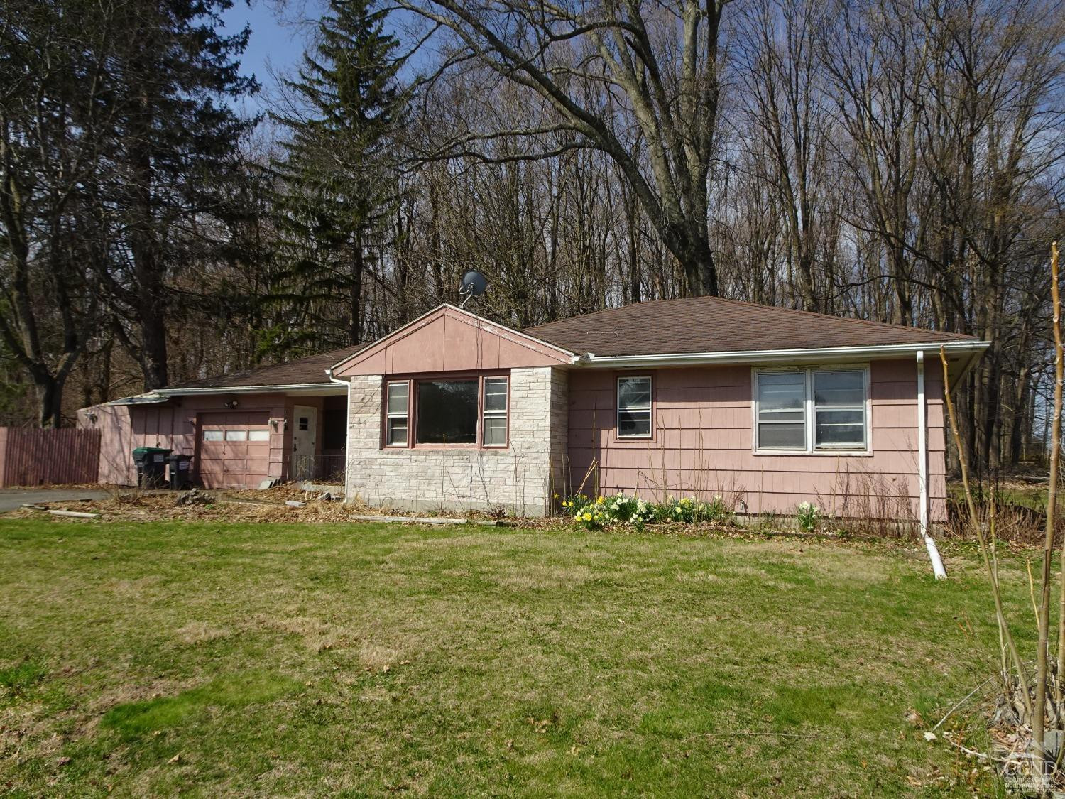 8 Hover Road Claverack, NY 12513 - Photo 2 of 21 a front view of a house with a yard