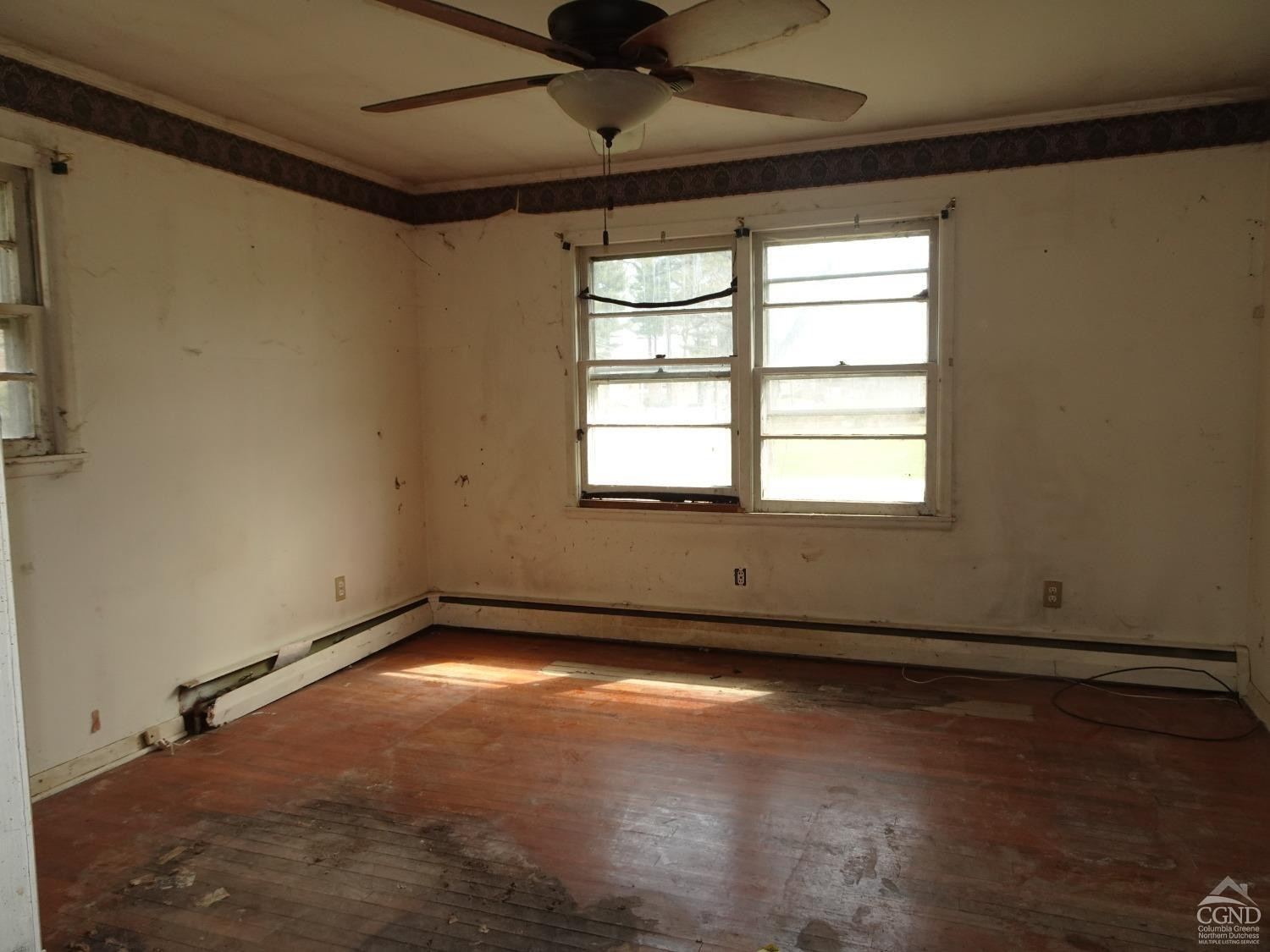 8 Hover Road Claverack, NY 12513 - Photo 8 of 21 an empty room with wooden floor and windows