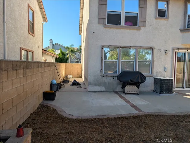 a view of a building with sitting area