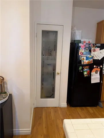 a living room with a couch and a dresser