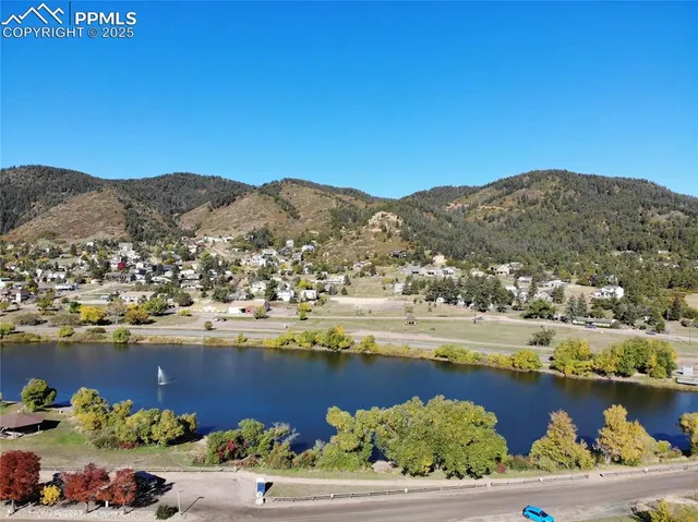 a view of a city with an ocean view