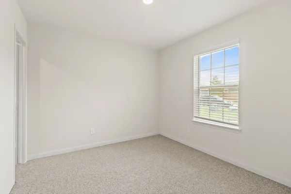 an empty room with a window