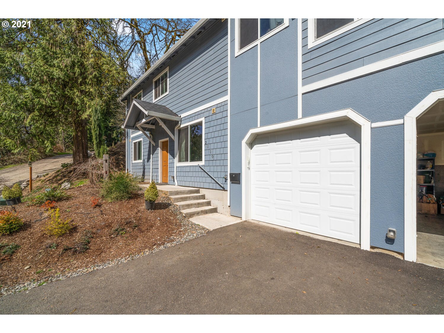 2110 Pioneer Street Ridgefield, WA 98642 - Photo 31 of 32 a front view of a house with a yard