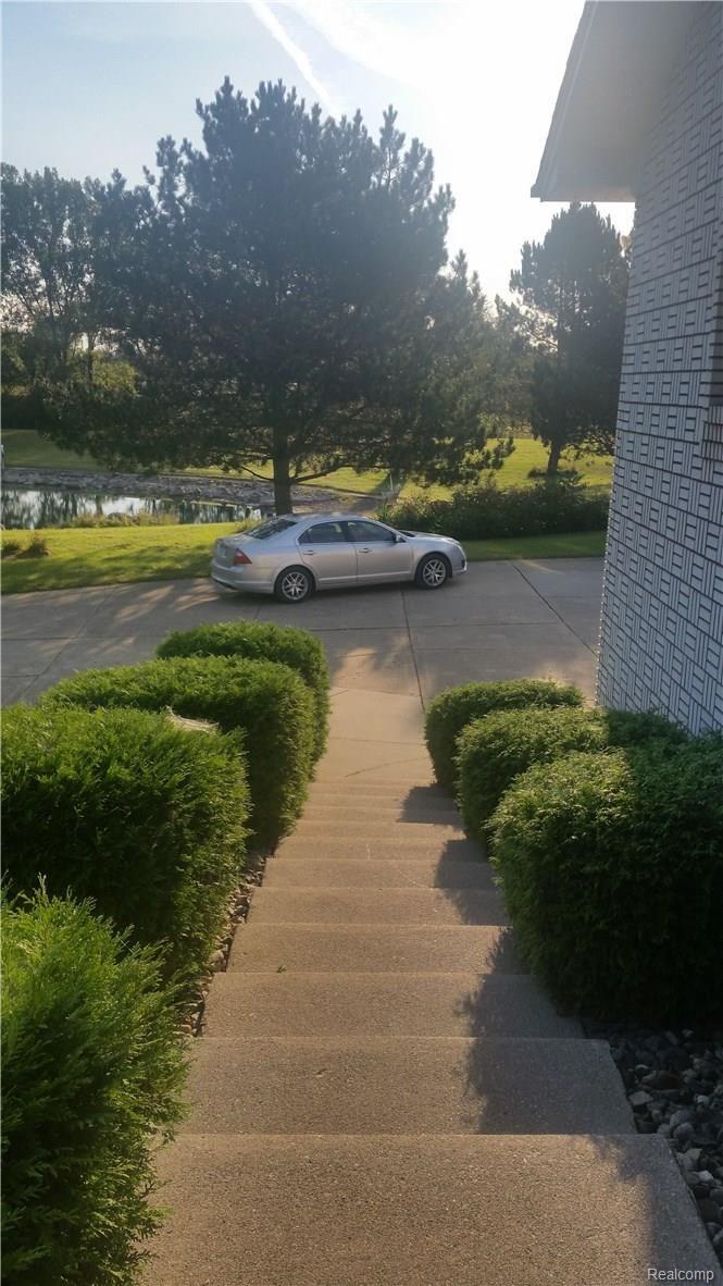 8550 Hough Road Almont, MI 48003 - Photo 15 of 54 front_stairs.jpg