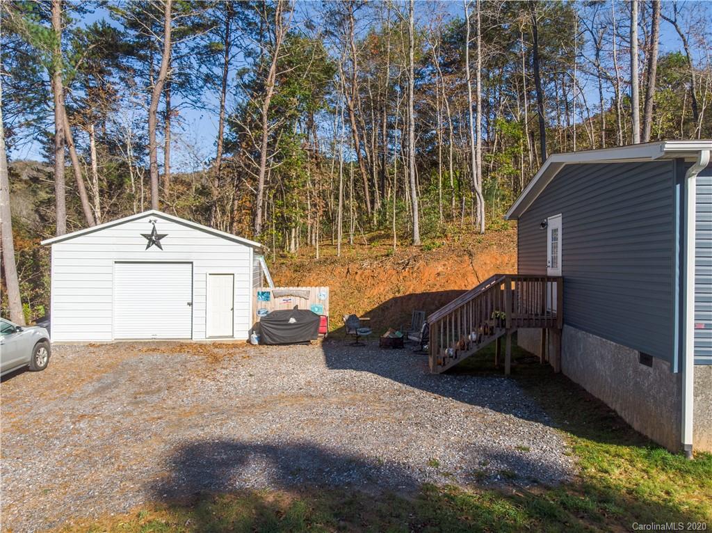 824 Dillsboro Road Sylva, NC 28779 - Photo 27 of 39 a row of car parked in front of house