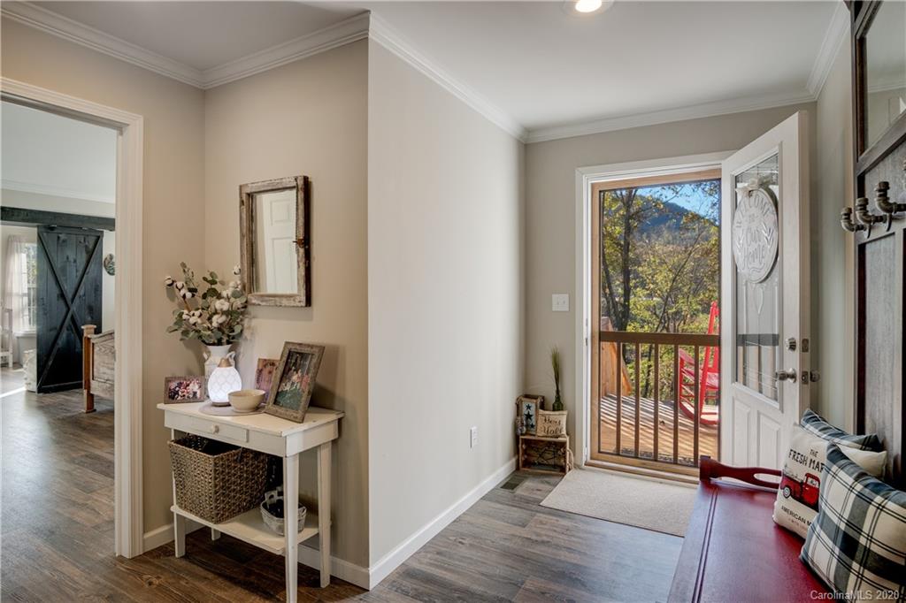 824 Dillsboro Road Sylva, NC 28779 - Photo 4 of 39 a view of a workspace with furniture and a window