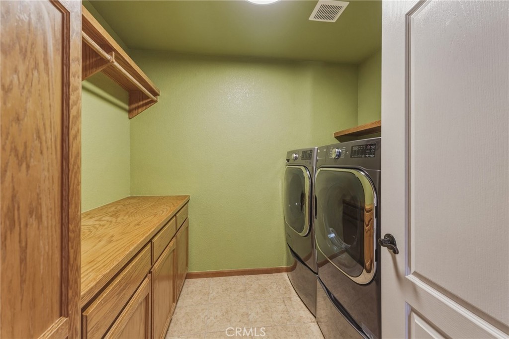 19501 Kinai Road Apple Valley, CA 92307 - Photo 36 of 49 a utility room with dryer and washer