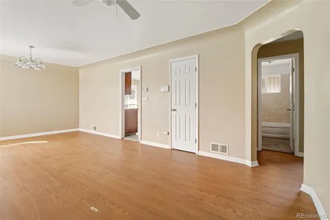 a view of an empty room and window