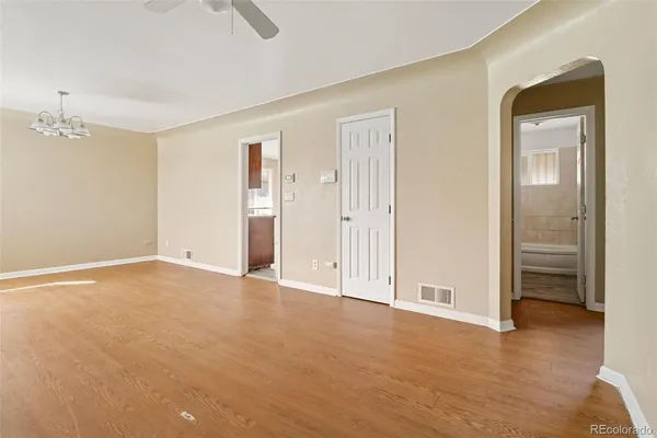 a view of an empty room and window