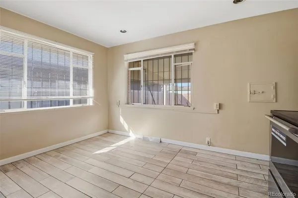 a view of an empty room with a window