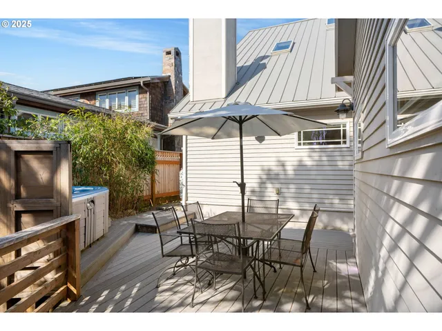 a view of a chairs and table in the patio