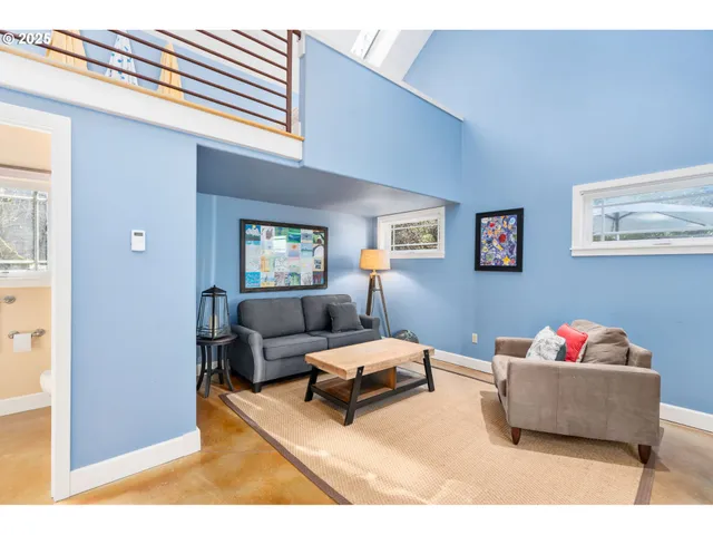 a living room with furniture and a couch