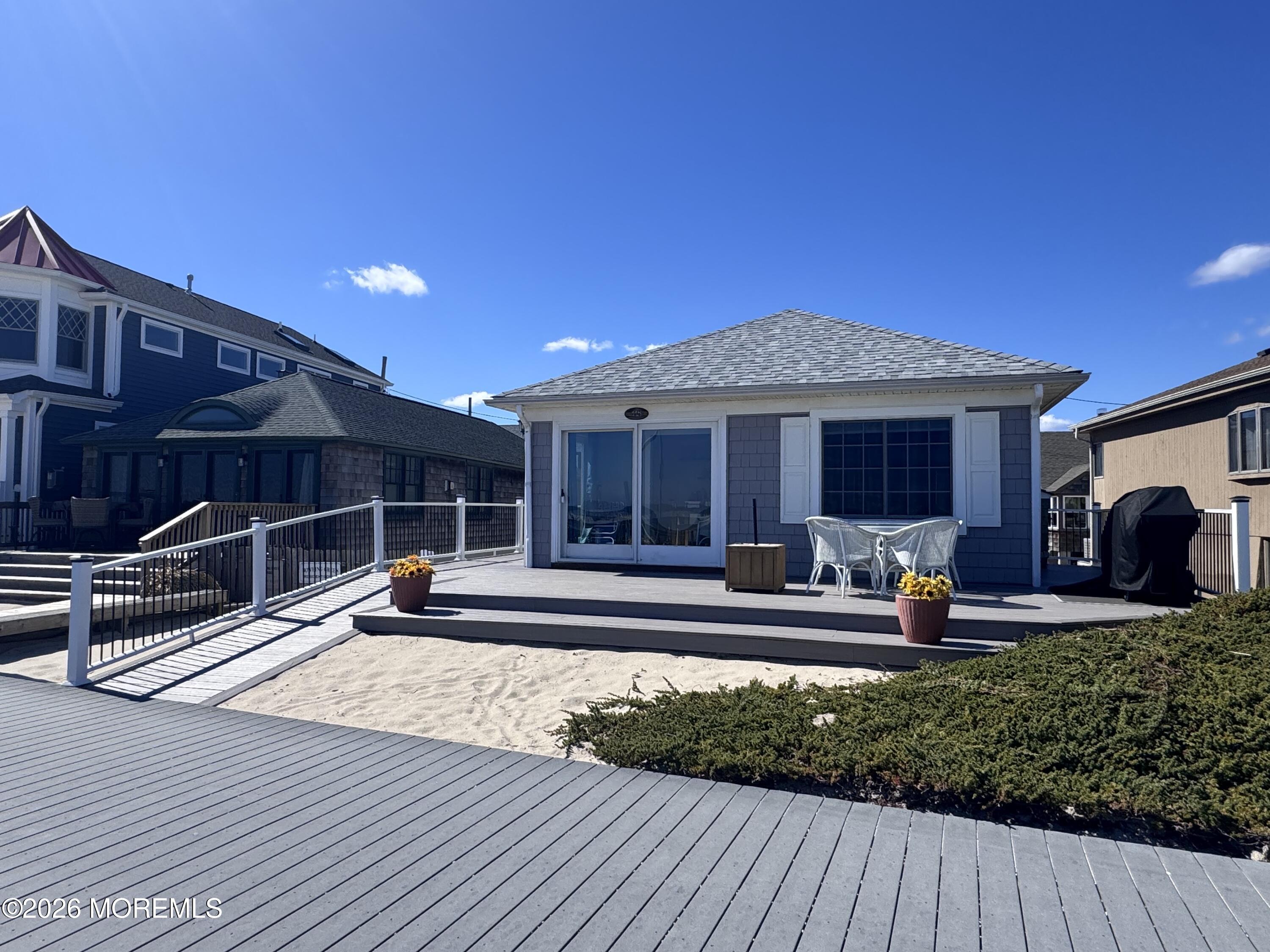 115 Boardwalk Point Pleasant Beach, NJ 08742 - Photo 5 of 23 a front view of a house with a yard