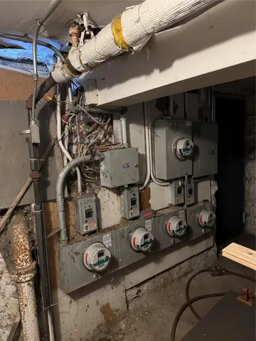 a kitchen with furniture and a water fountain