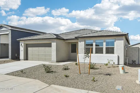 a front view of a house with a patio