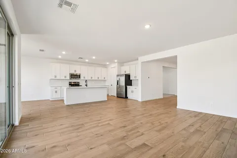 a view of kitchen with wooden floor