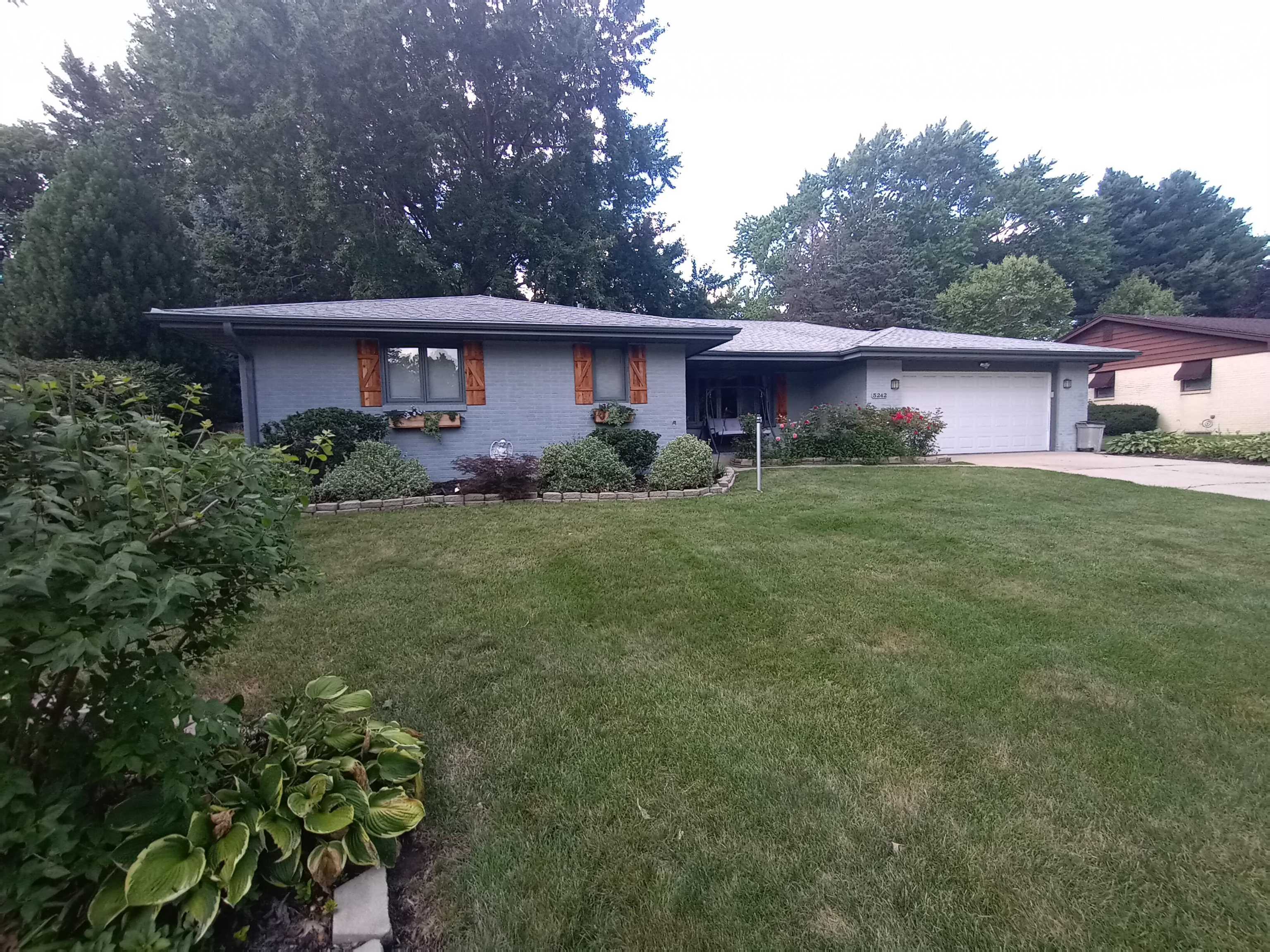 5242 Brookview Road Rockford, IL 61107 - Photo 1 of 44 a view of a house with a yard