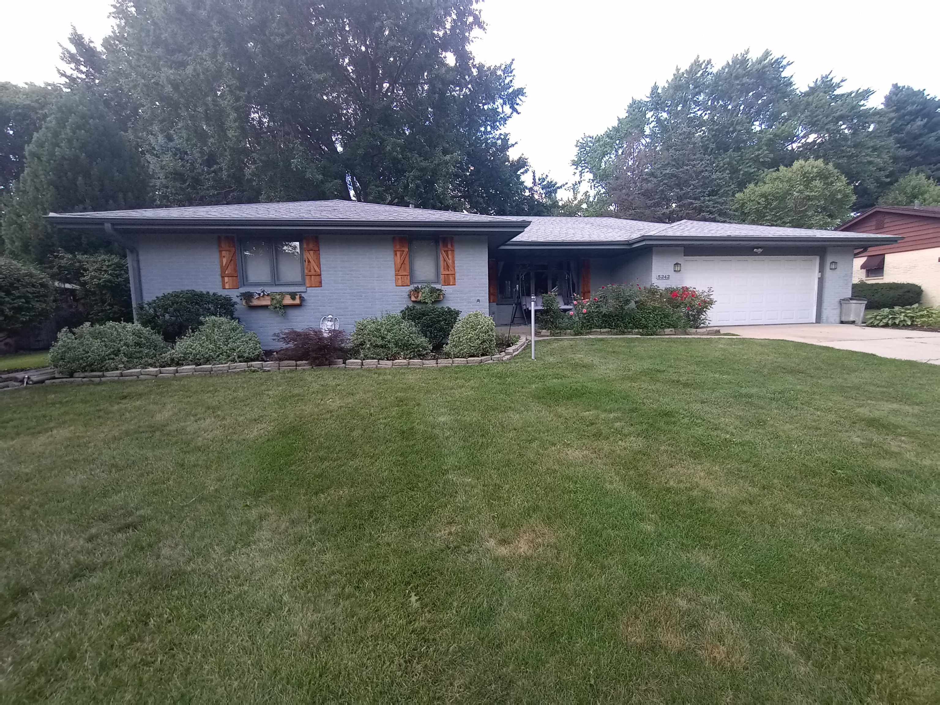 5242 Brookview Road Rockford, IL 61107 - Photo 2 of 44 a view of a house with a yard