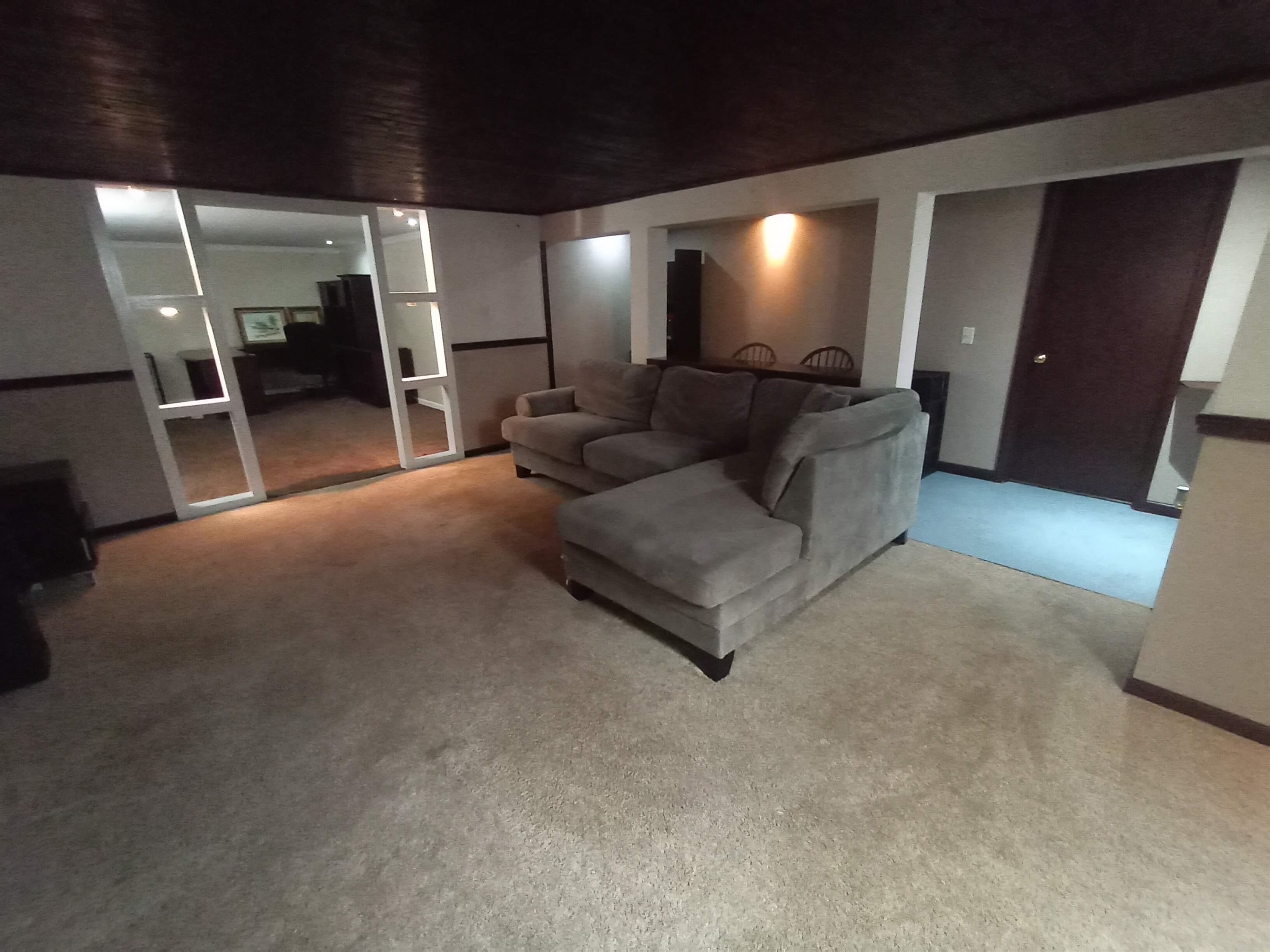 5242 Brookview Road Rockford, IL 61107 - Photo 31 of 44 a living room with furniture and a glass door