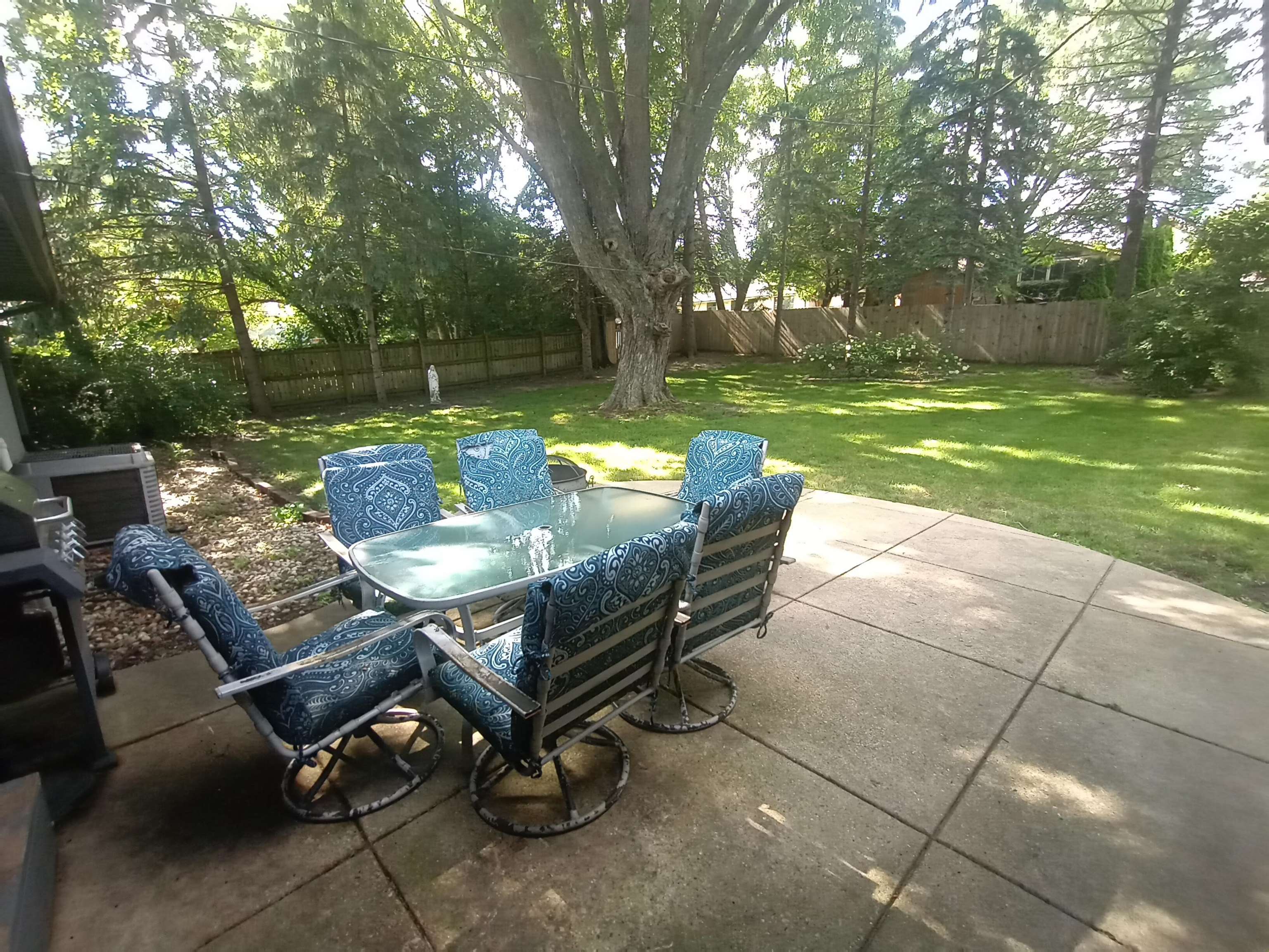 5242 Brookview Road Rockford, IL 61107 - Photo 40 of 44 a view of a backyard with sitting area furniture and garden